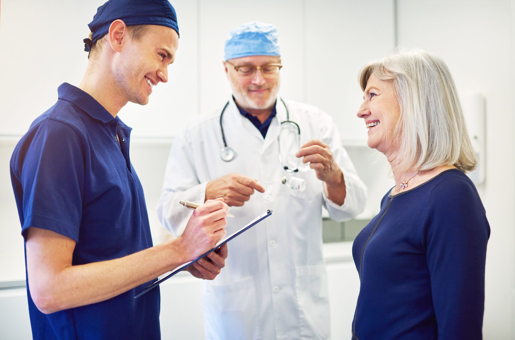 Medical Personnel Consulting a Patient
